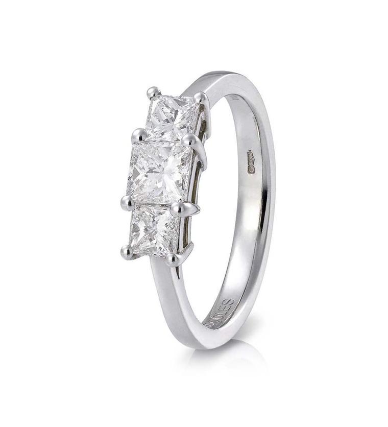 Boodles Trilogy three stone engagement ring in platinum with three radiant-cut diamonds.